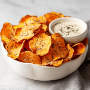 Crispy homemade gluten free chips in ceramic bowl